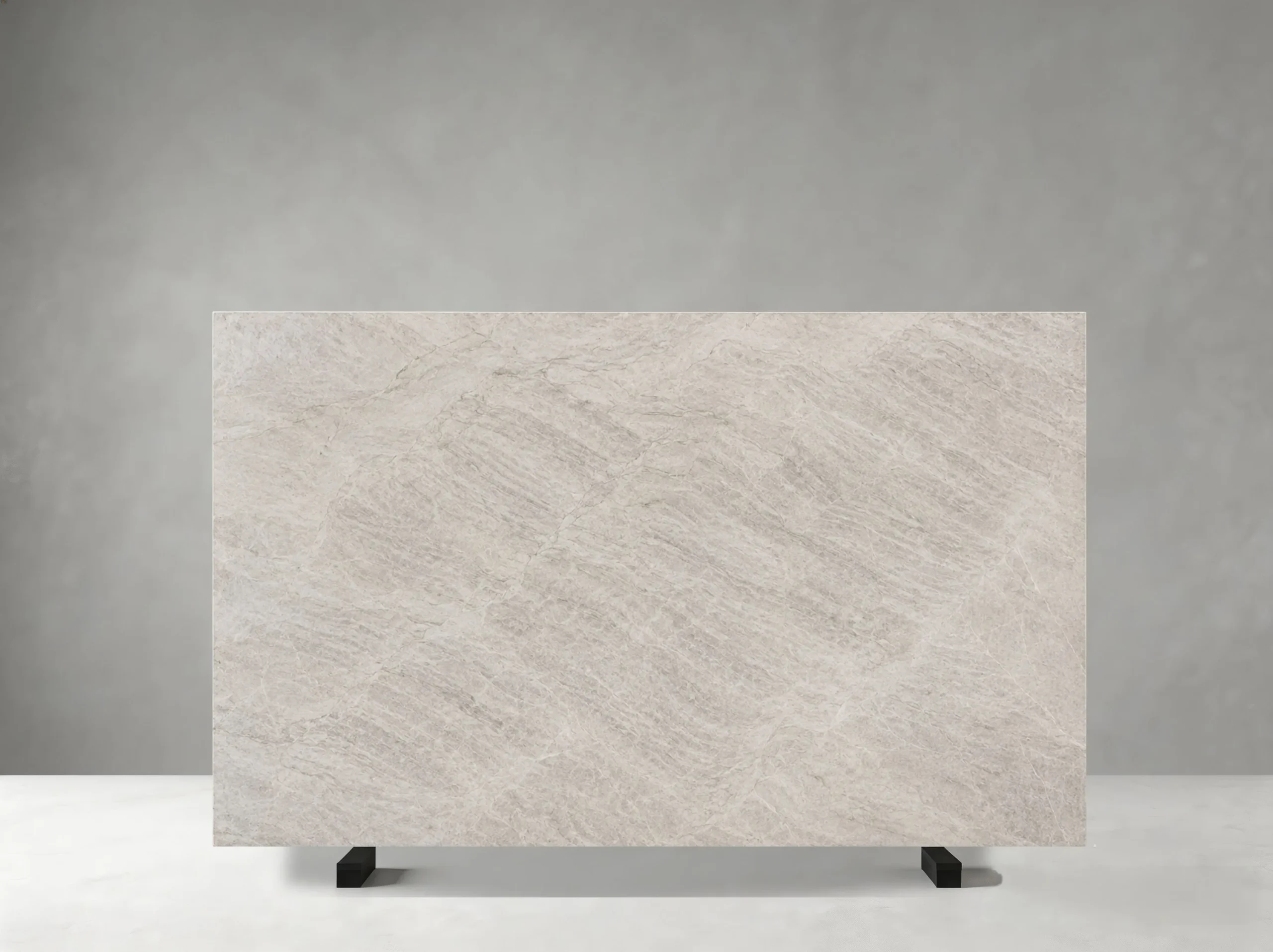 white-taj-mahal-quartzite-sample-panel-02.webp White Taj Mahal Quartzite sample panel displaying pale grey veins and warm mineral details
