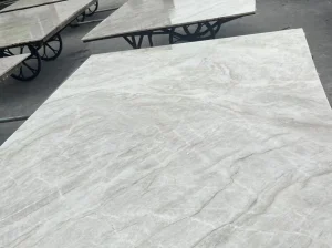 White Taj Mahal Quartzite slabs undergoing material selection and quality inspection