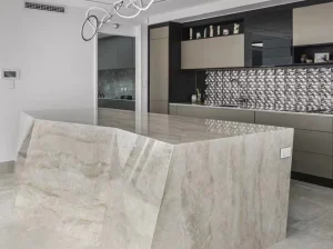 White Taj Mahal Quartzite waterfall kitchen island in a contemporary luxury interior