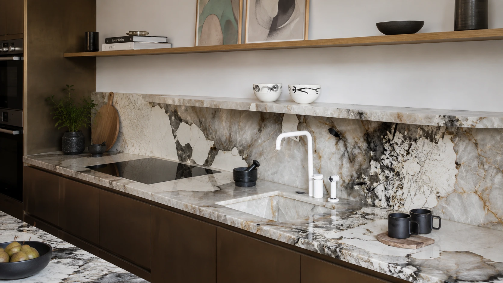 Patagonia Quartzite countertop and full-height backsplash in a luxury kitchen
