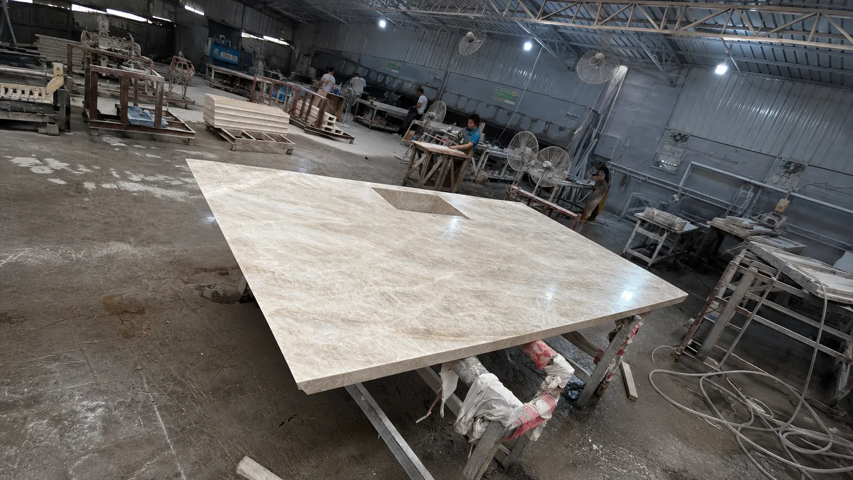 Quartzite countertop fabrication detail with cut-out edge and precision stone processing