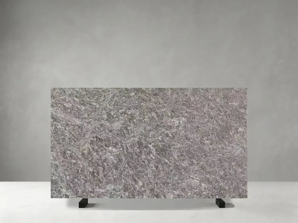 Asterix Black Granite polished slab showing a dark black-grey surface with energetic silver-white patterning