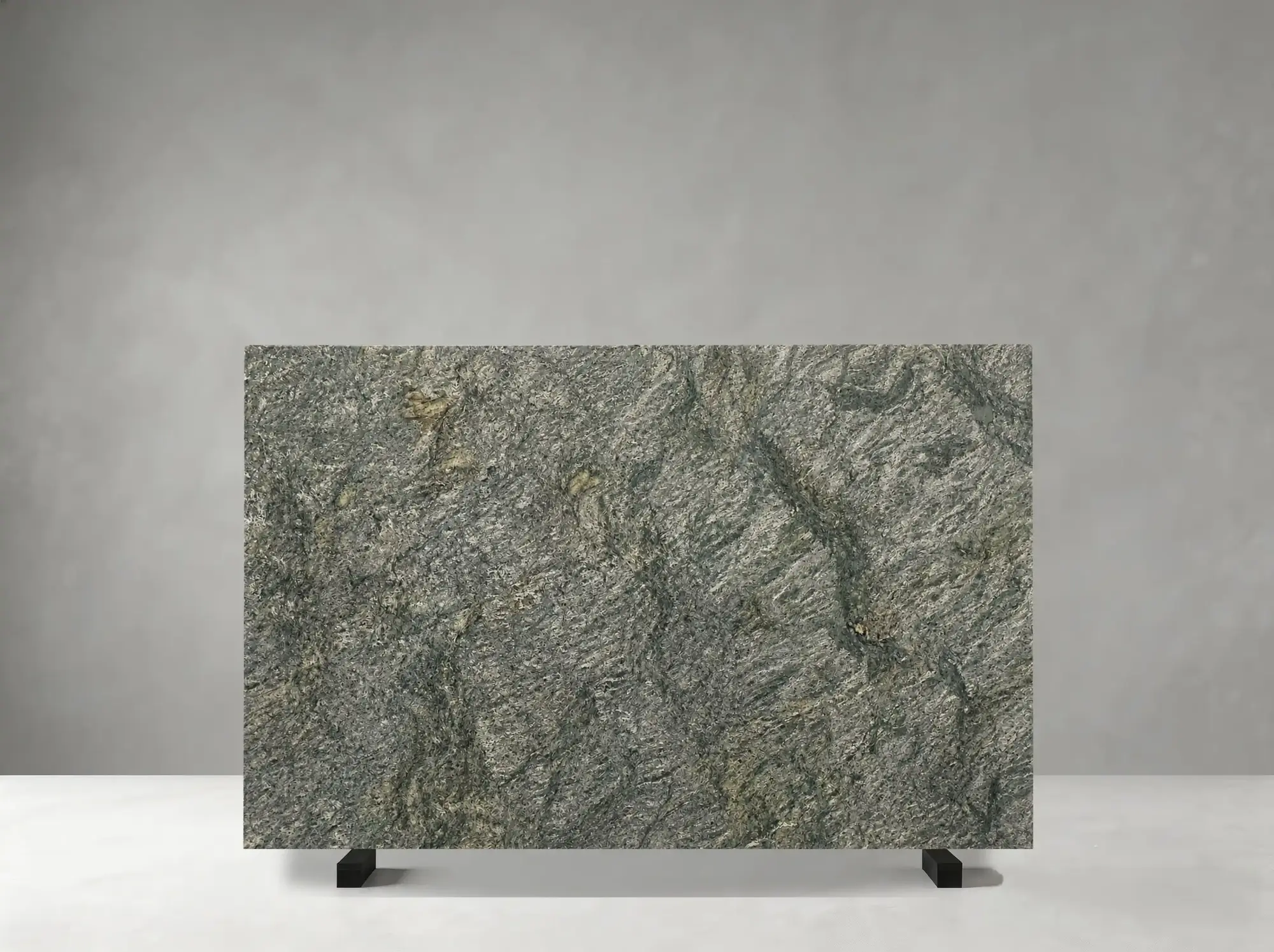 Asterix Black Granite polished slab detail showing swirling silver crystalline detail and dynamic natural movement