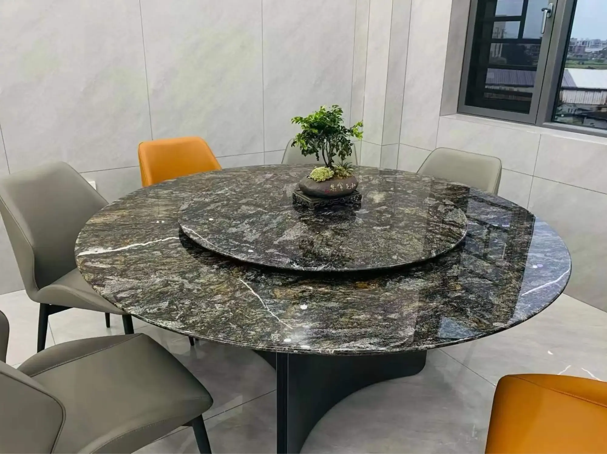 Asterix Black Granite round dining table with lazy susan application