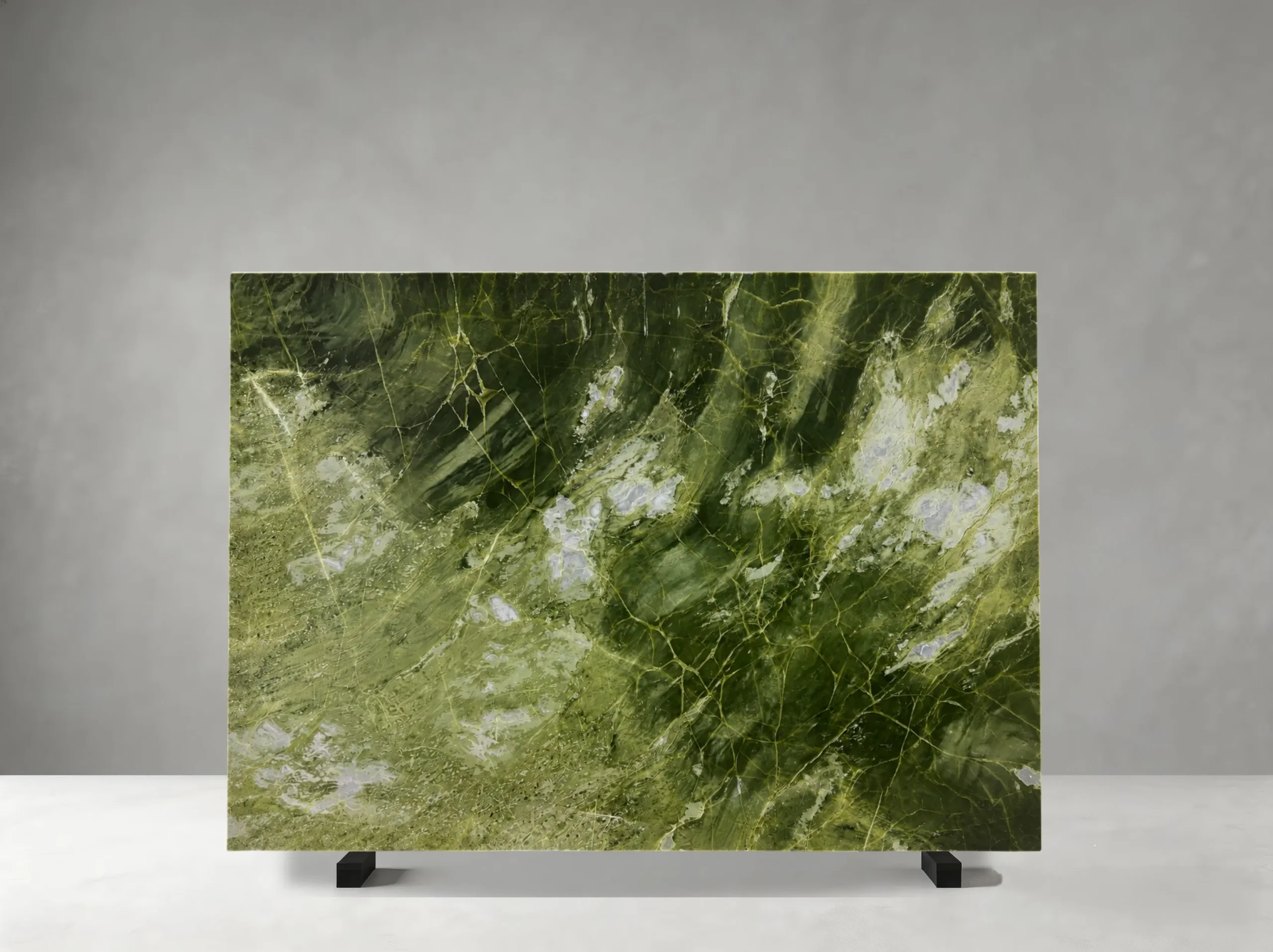 Athens Jade Marble polished slab with deep green surface and flowing white mineral clouds