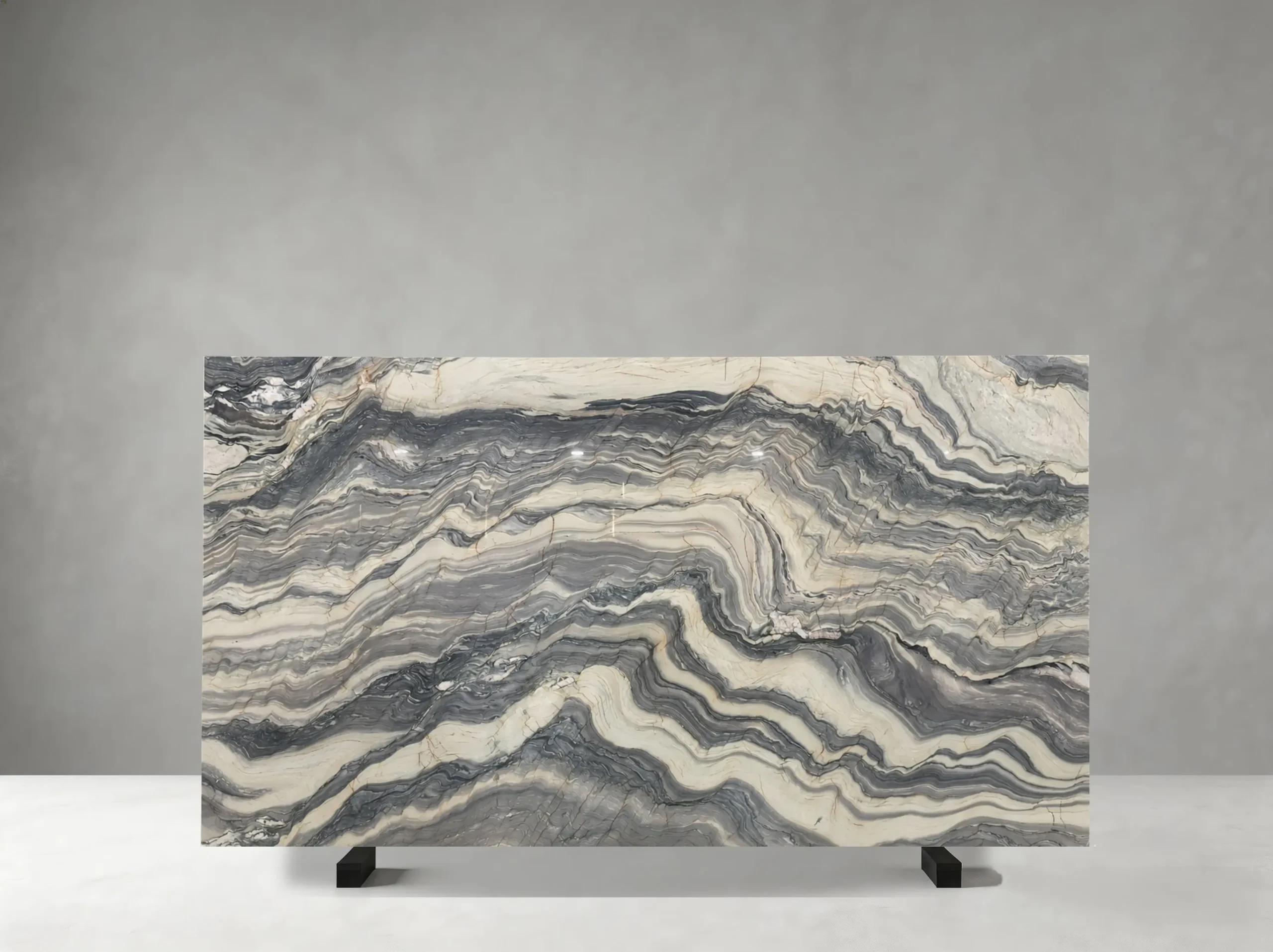 Brazilian Fusion Blue Quartzite polished slab 02 showing high-contrast wave bands with layered directional movement
