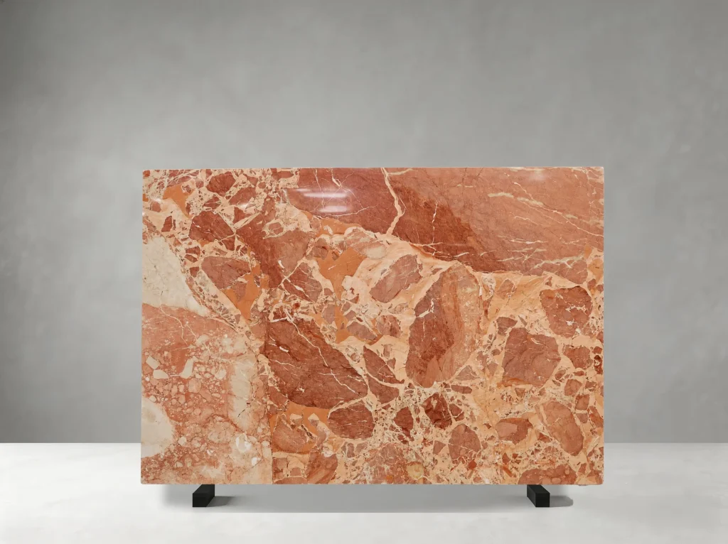 Breccia Fumane Marble full slab showing rust red, burnt orange, brick, cream and warm beige tones with dense brecciated fragments with pale mineral seams and expressive tonal contrast