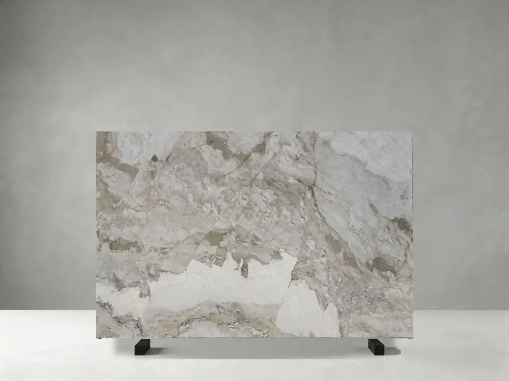 Camus Brown Marble polished slab showing a warm beige field with layered brown and cream movement