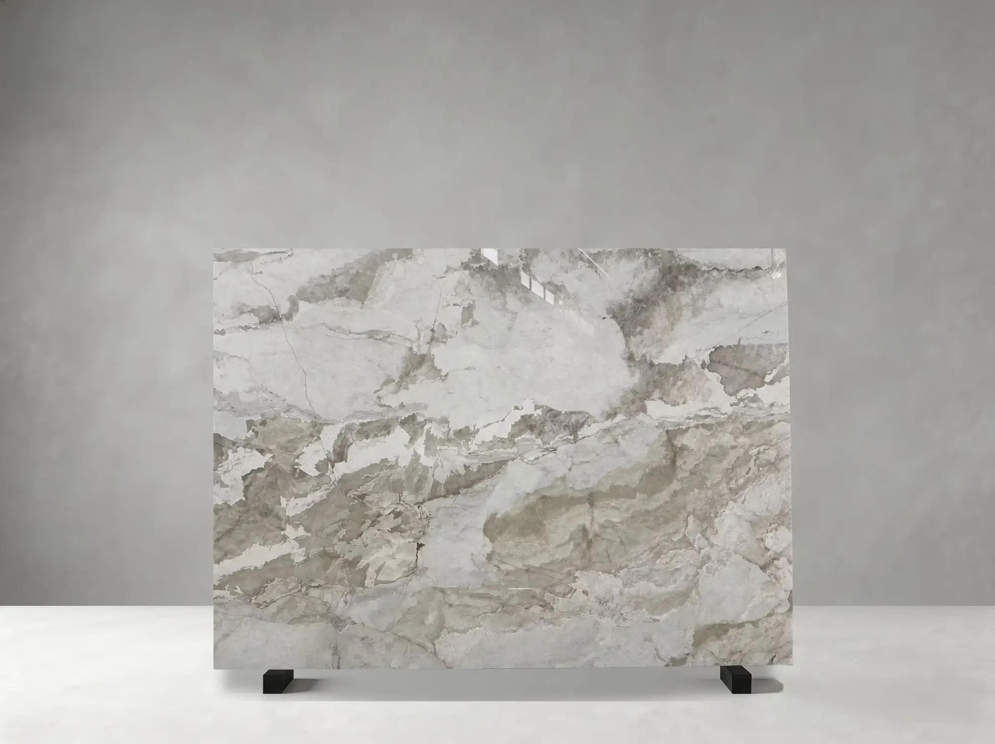 Camus Brown Marble polished slab detail showing soft cloudy brecciated movement with warm natural variation