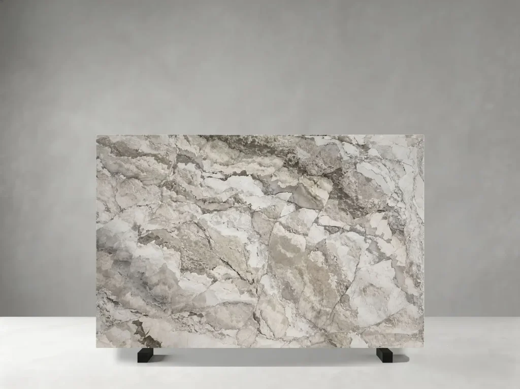 Camus Grey Marble polished slab showing a layered grey field with expressive white and taupe movement