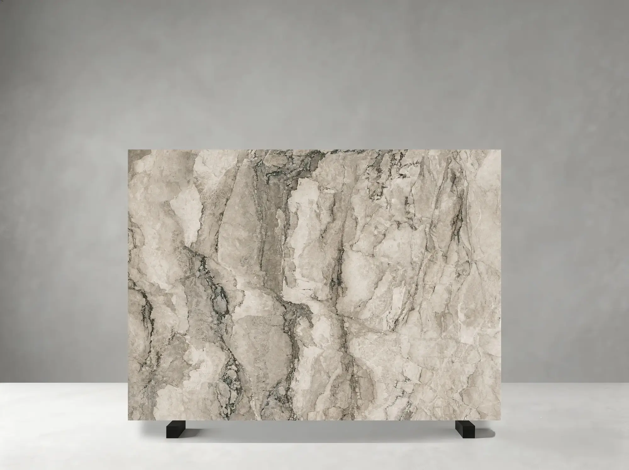 Camus Grey Marble polished slab detail showing bold cloudy brecciated movement and dramatic tonal contrast