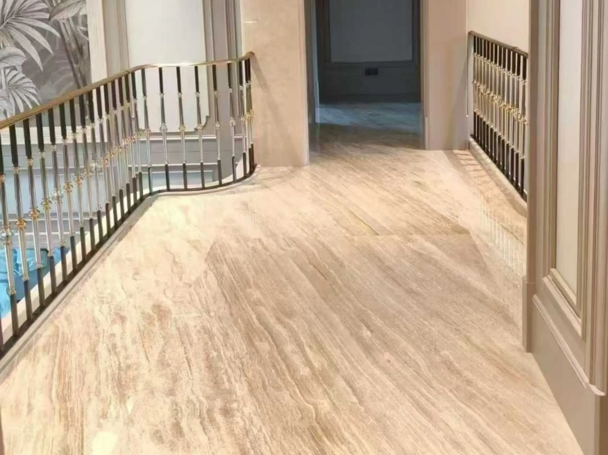 Daino Reale Marble hallway flooring with continuous warm beige directional veining