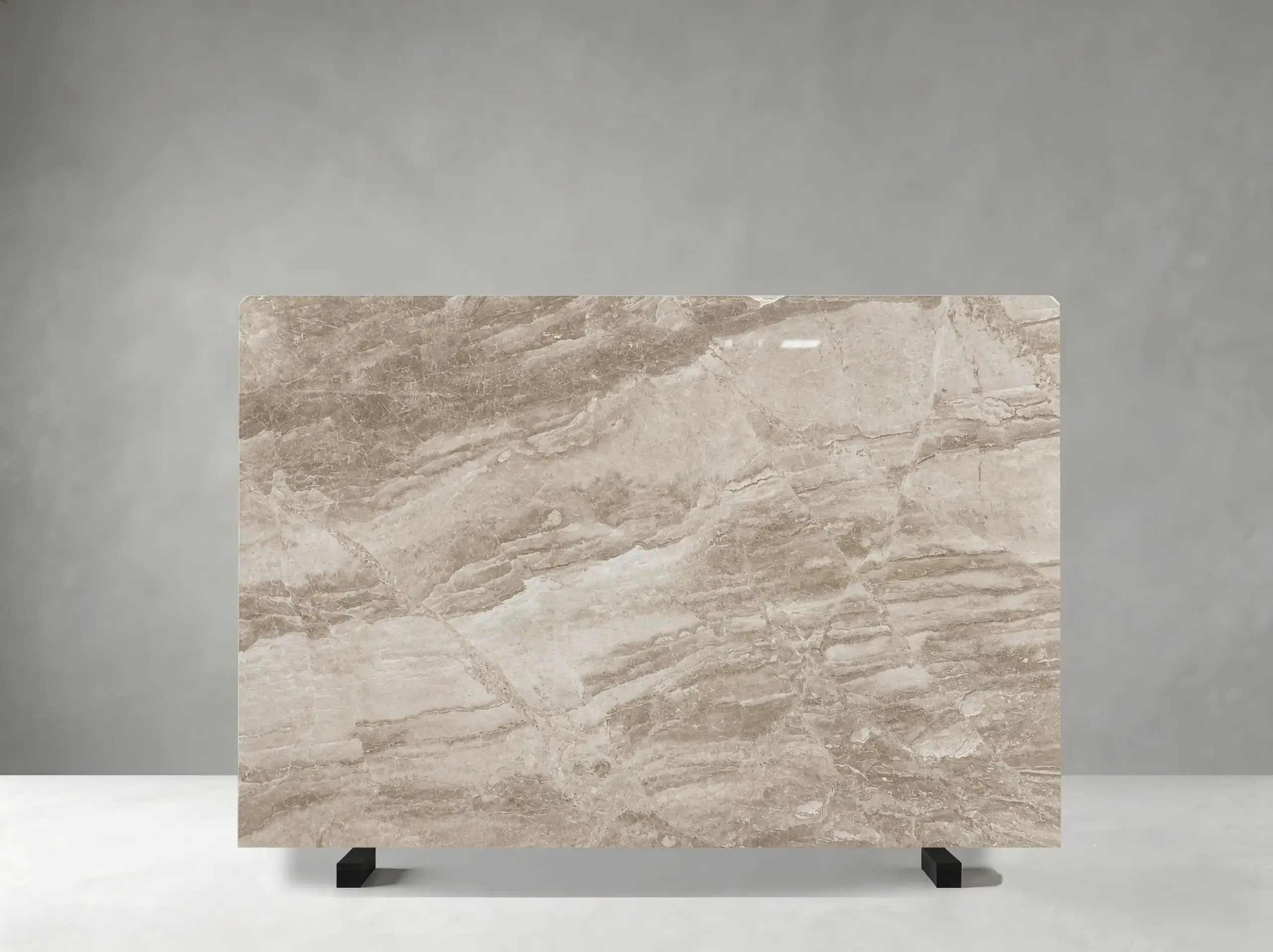 Daino Royal Marble polished slab with soft beige field and broad ivory cloudy movement