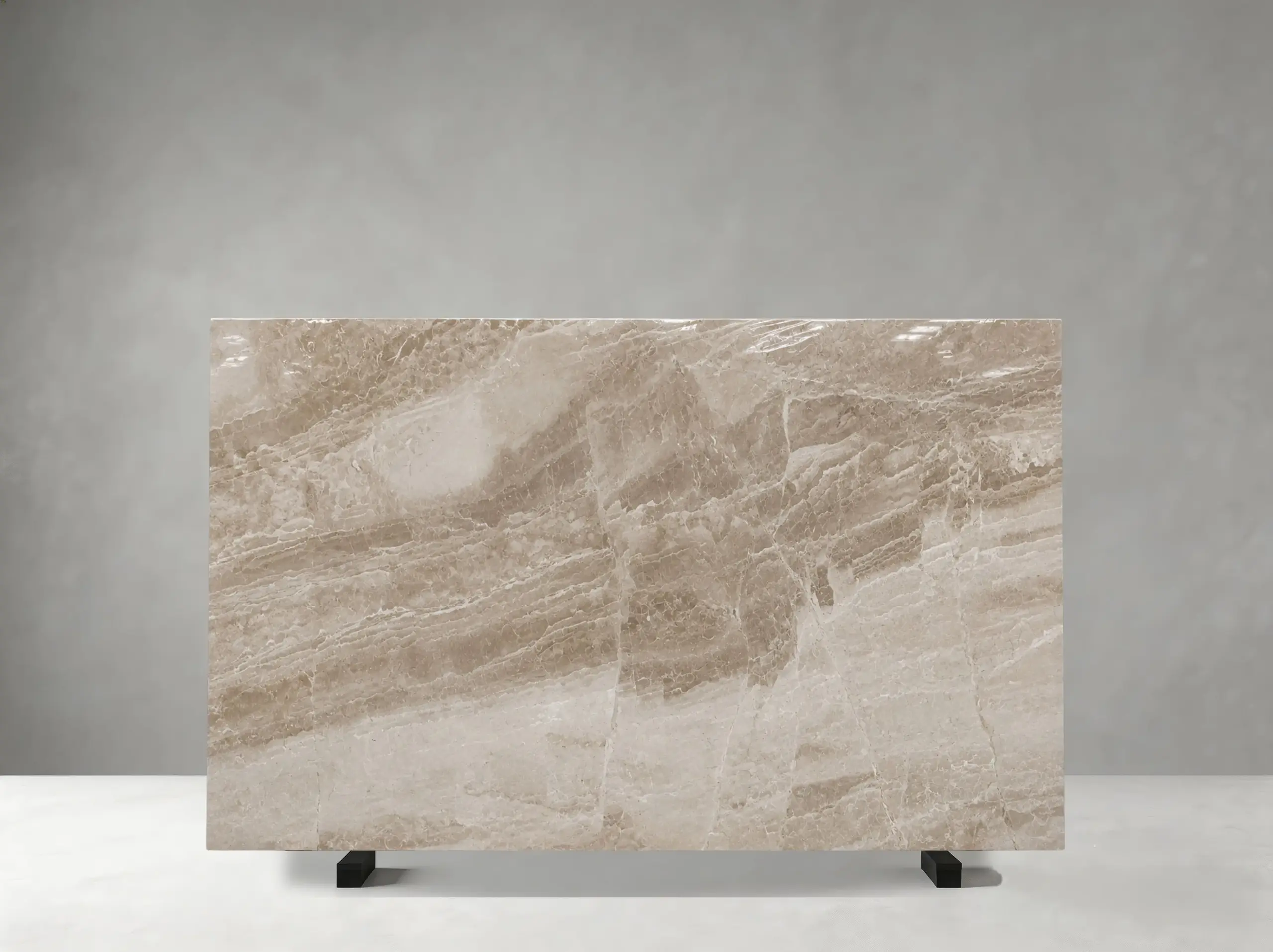 Daino Royal Marble polished slab with taupe fragments and flowing cream white mineral patterns