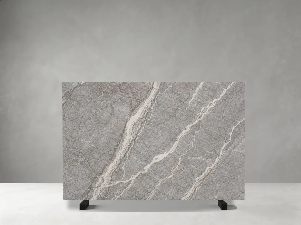 Fiore Di Bosco Marble full slab showing light grey, warm greige and pale silver tones with long parallel white veins with fine diagonal mineral lines