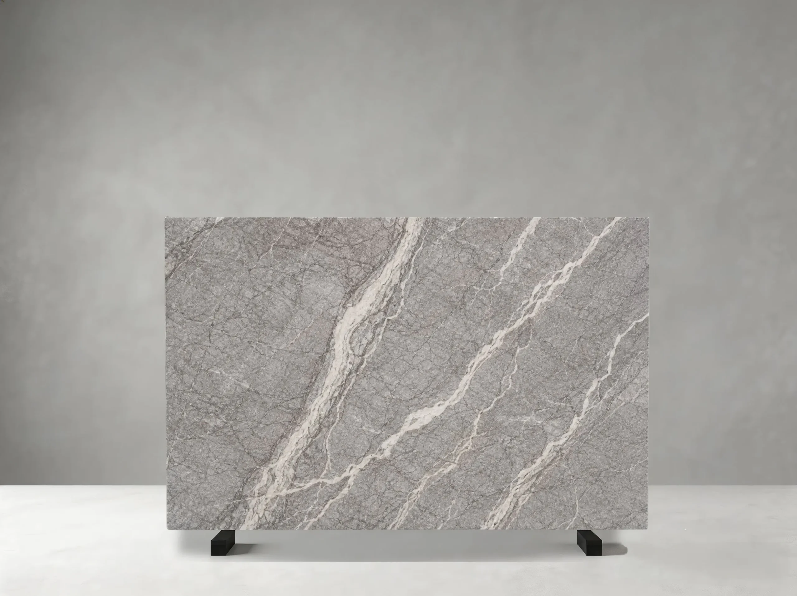 Fiore Di Bosco Marble full slab showing light grey, warm greige and pale silver tones with long parallel white veins with fine diagonal mineral lines