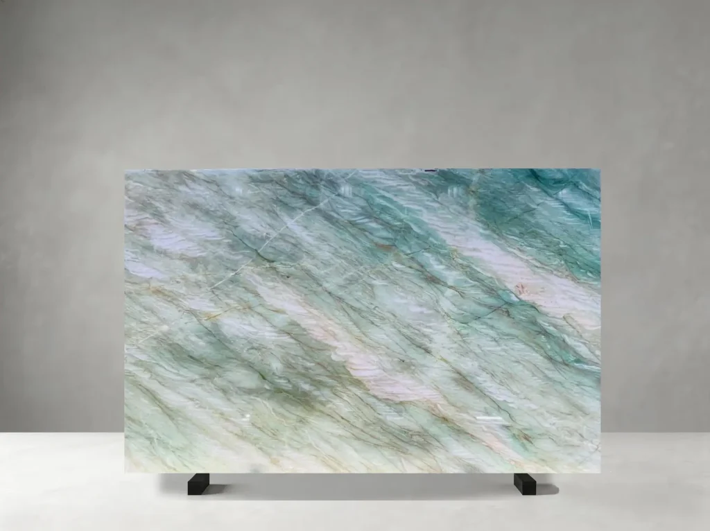 Gaya Green Quartzite polished slab showing a light green-white field with calm flowing mineral detail