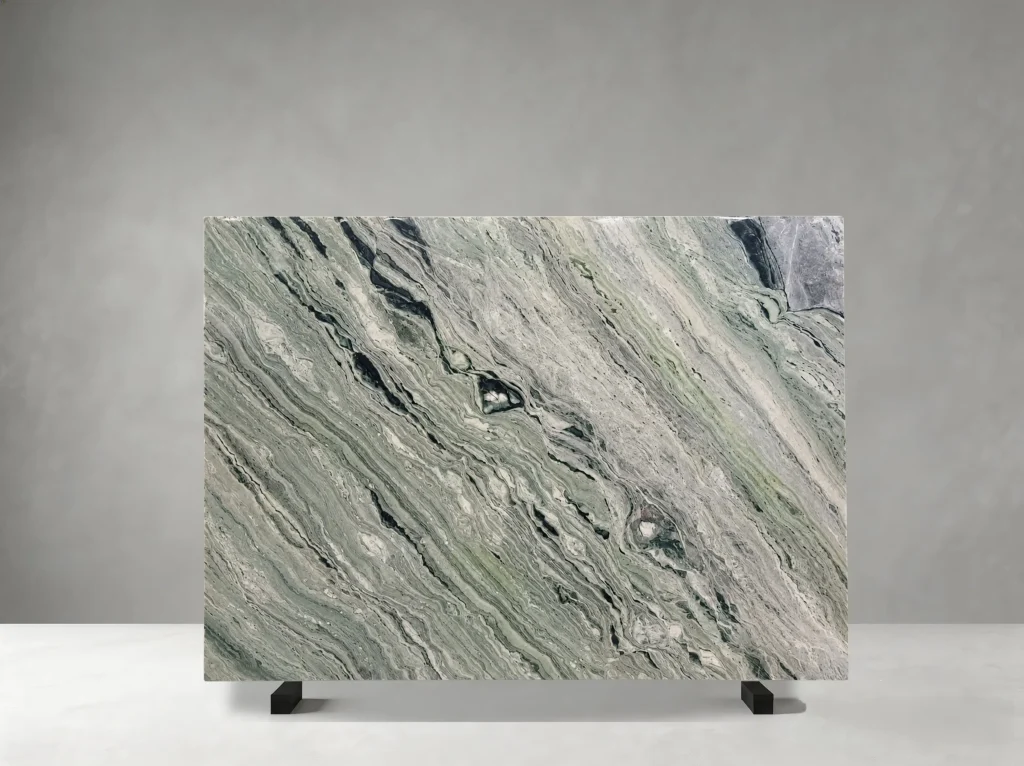 Green Shangri-La Jade Marble full slab showing sage green, forest green, white and charcoal tones with strong flowing bands and wavy mineral layers with dramatic directional movement