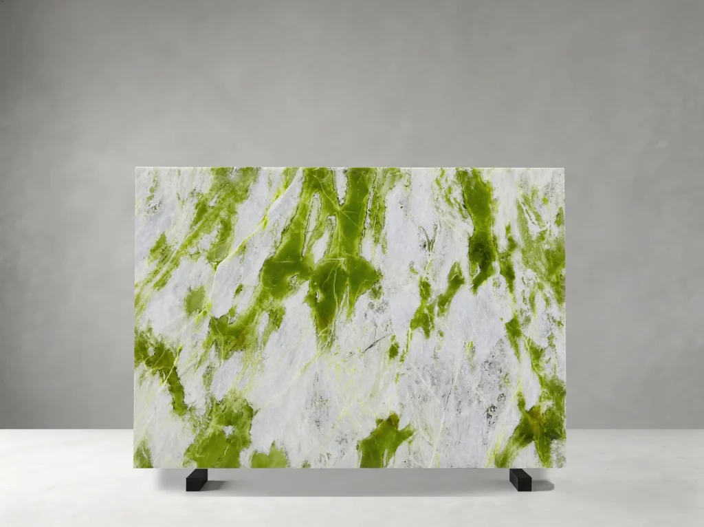 Ice Jade Glacier Green Marble polished slab with vivid green streaks across an icy white background