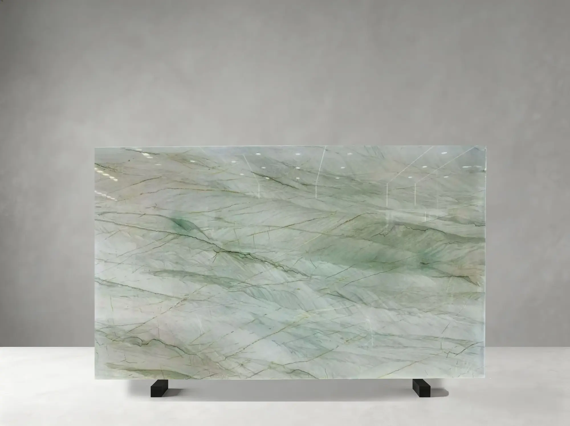 Jade Quartzite polished slab detail showing fluid diagonal veins with elegant layered movement