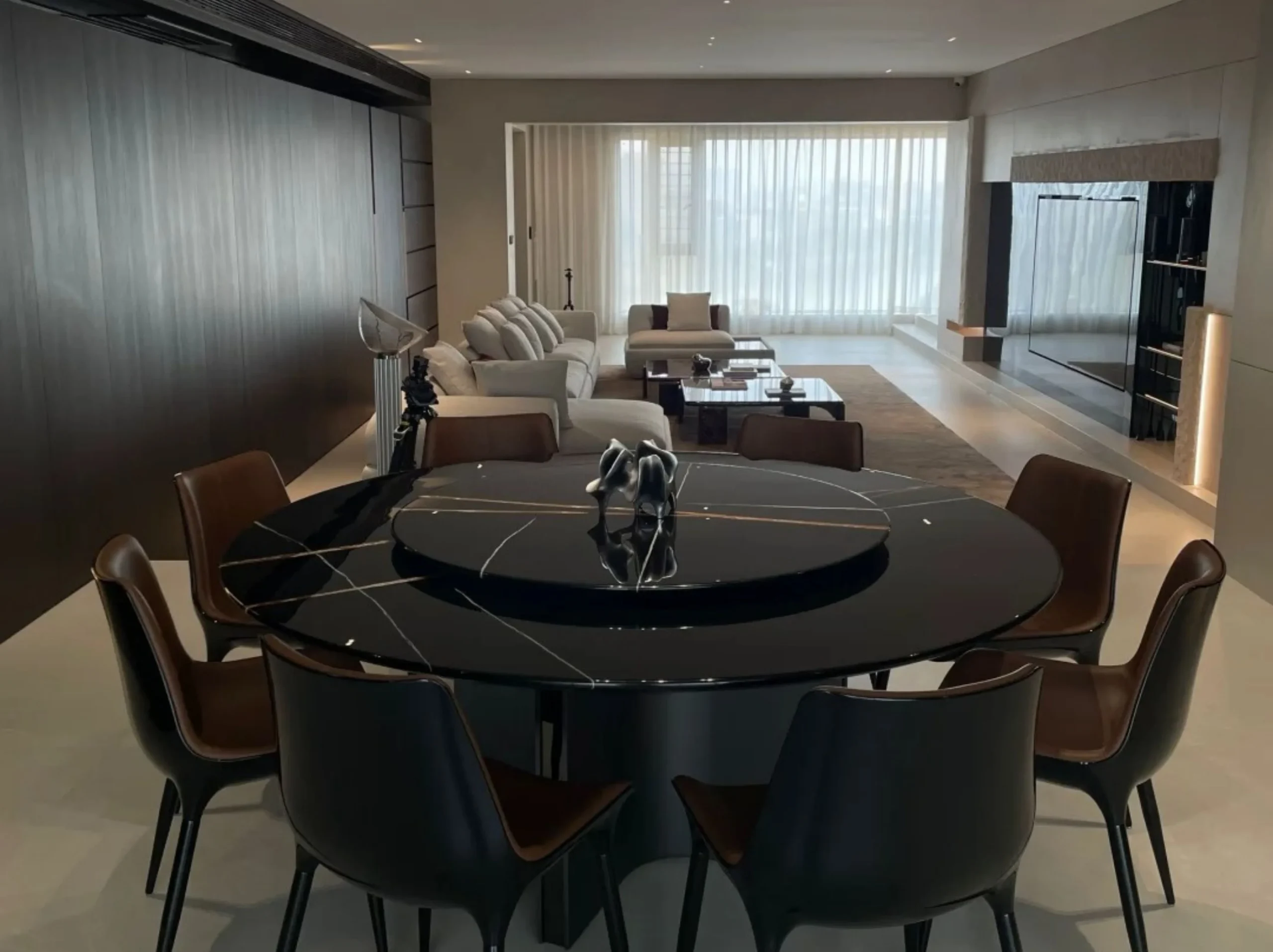 Marbre Noir Gris Aziza Marble round dining table with lazy susan for a luxury interior project