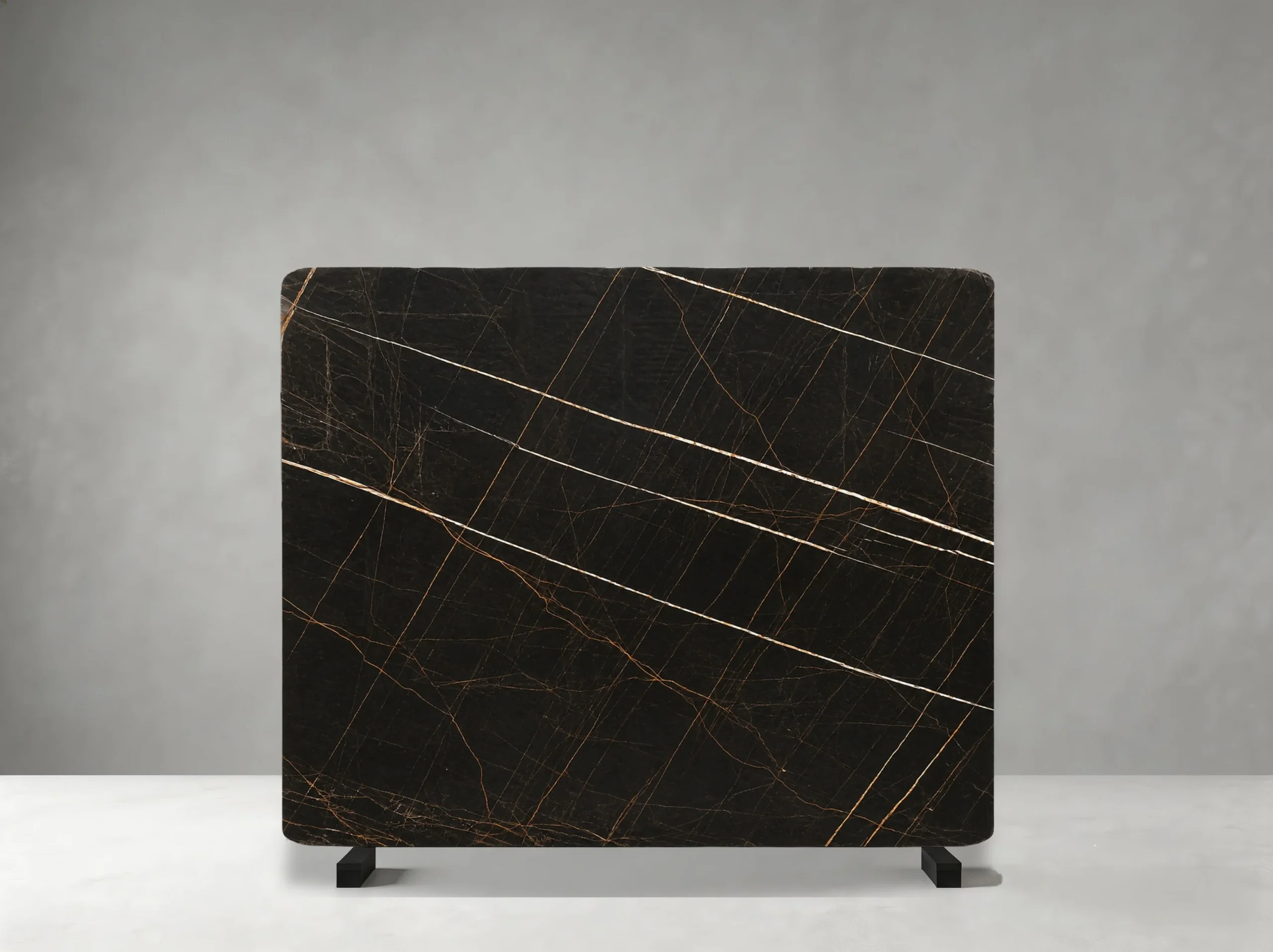 Marbre Noir Gris Aziza Marble full slab showing deep black, charcoal and warm bronze-gold tones with fine intersecting golden veins over a compact dark background
