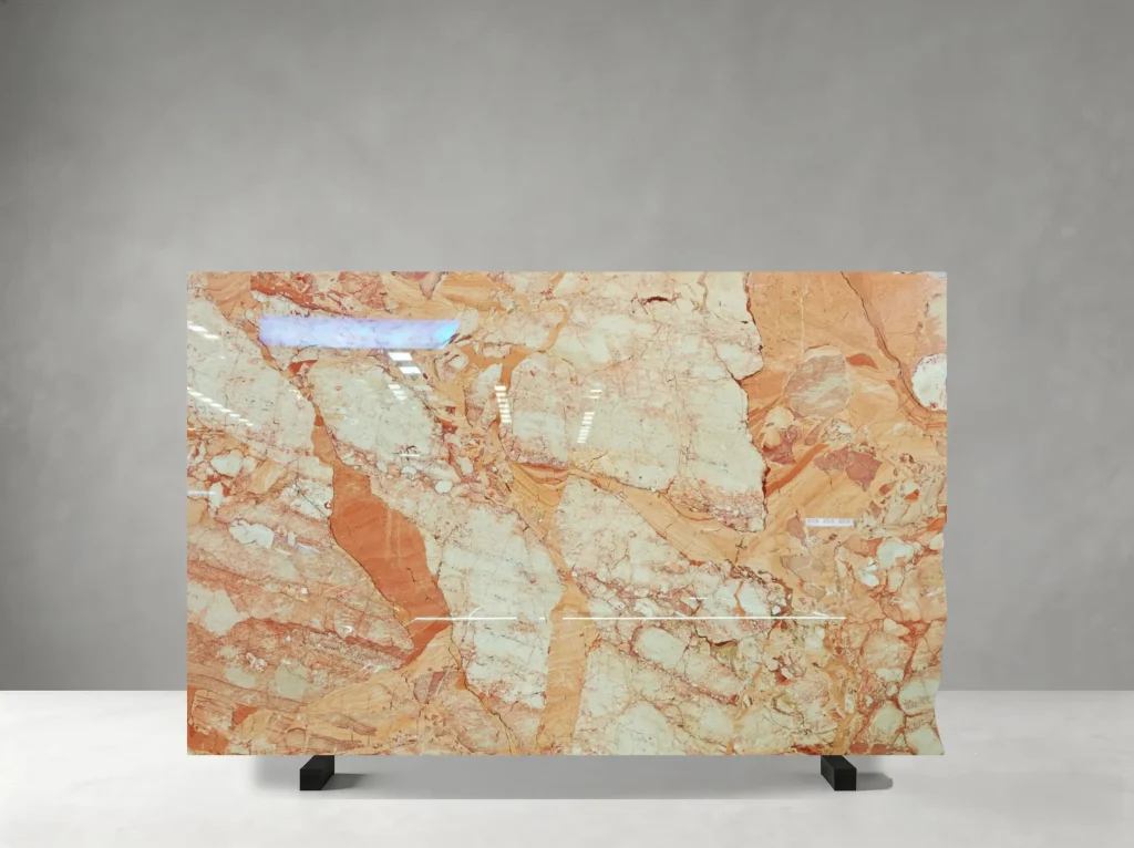 Marmo Brecchia Pernice Scuro full slab showing warm orange, reddish brown, ochre, cream and pale green-beige tones with large broken mineral fields with deep seams and layered brecciated movement