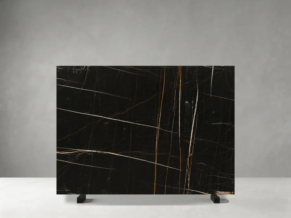 Marmo Nero Tunisi Marble full slab showing deep black, charcoal and warm brown-gold tones with fine angular golden veins and slender intersecting mineral lines