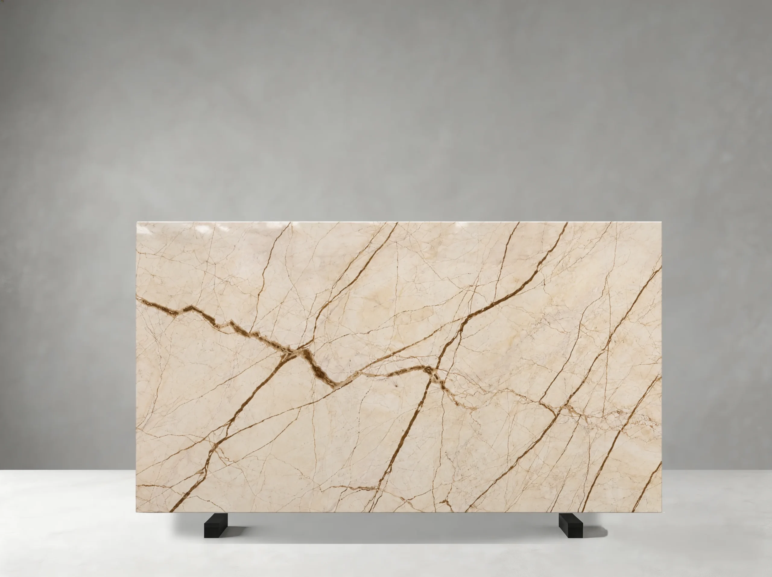 Menes Gold Marble slab with creamy beige and muted gold tones with sweeping brown-gold veining