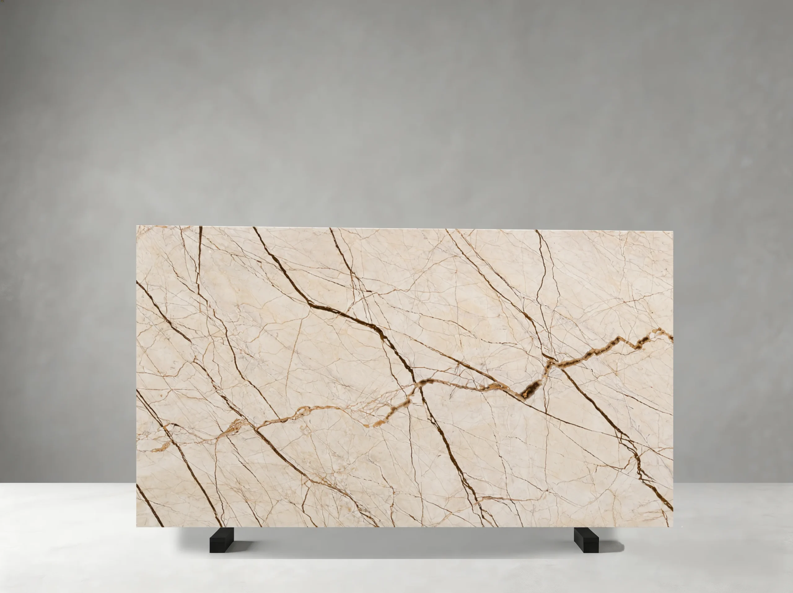 Menes Gold Marble full slab showing creamy beige and muted gold tones with sweeping brown-gold veining