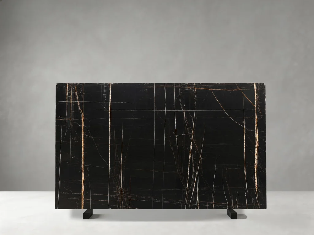 Noir Aziza Marble full slab showing black, dark charcoal and bronze-gold tones with fine linear golden veins with subtle cross-cut mineral threads