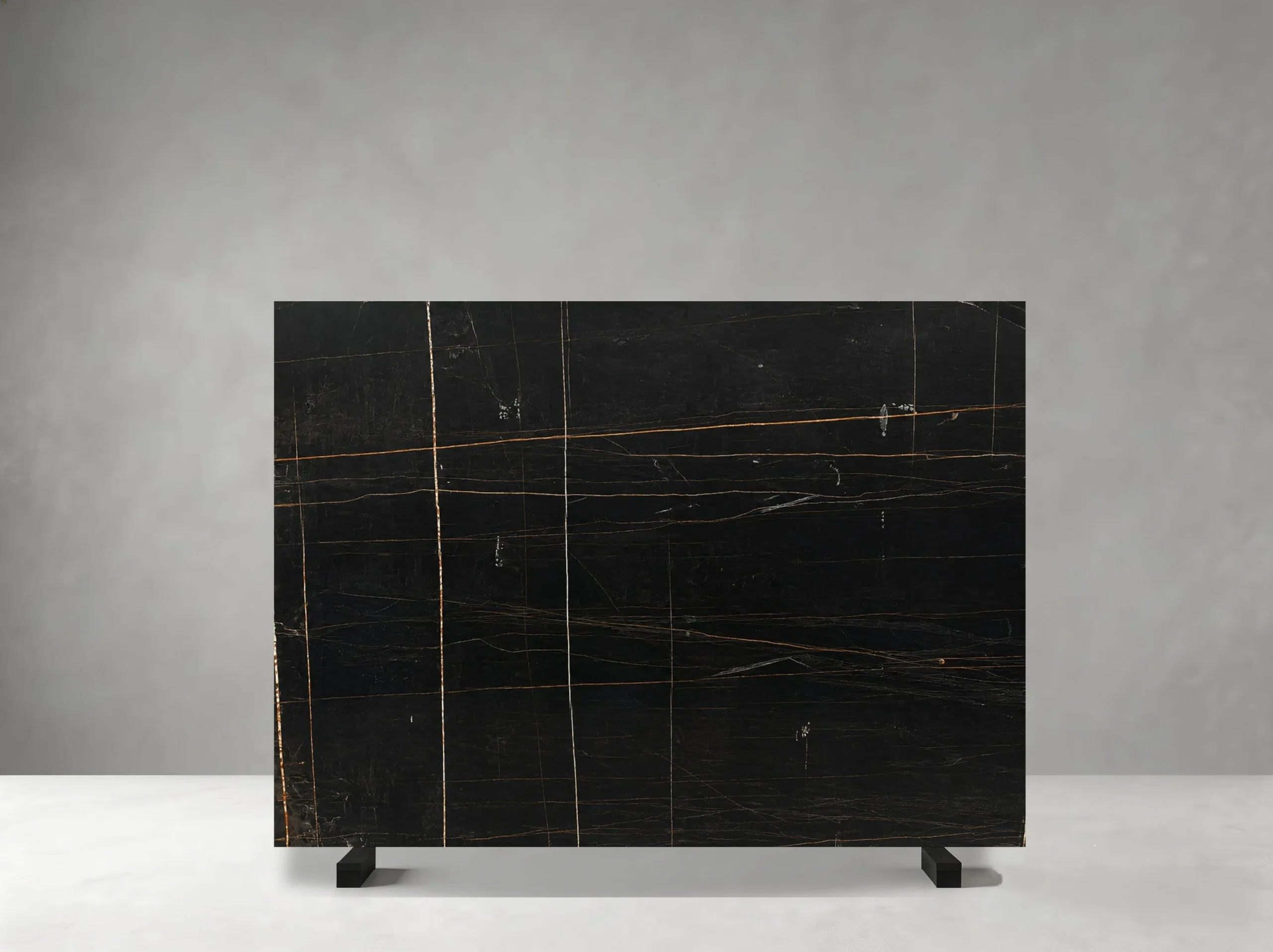 Noir Aziza Marble full slab showing black, dark charcoal and bronze-gold tones with fine linear golden veins with subtle cross-cut mineral threads