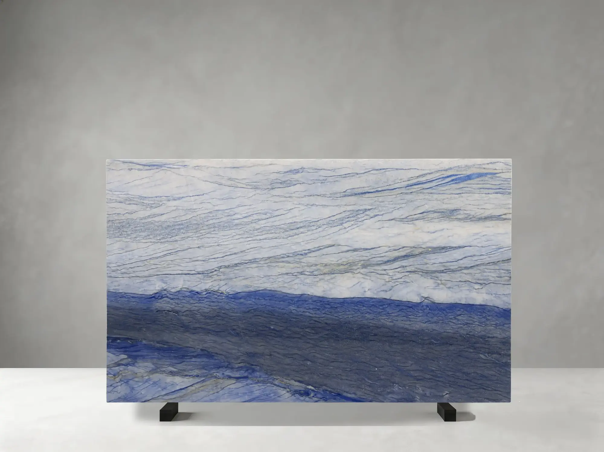 Royal Blue Quartzite polished slab detail showing strong blue wave bands and vivid flowing movement