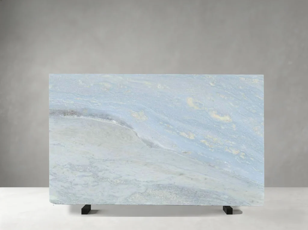 Sky Blue Marble polished slab 01 showing soft directional waves with restrained crystalline variation