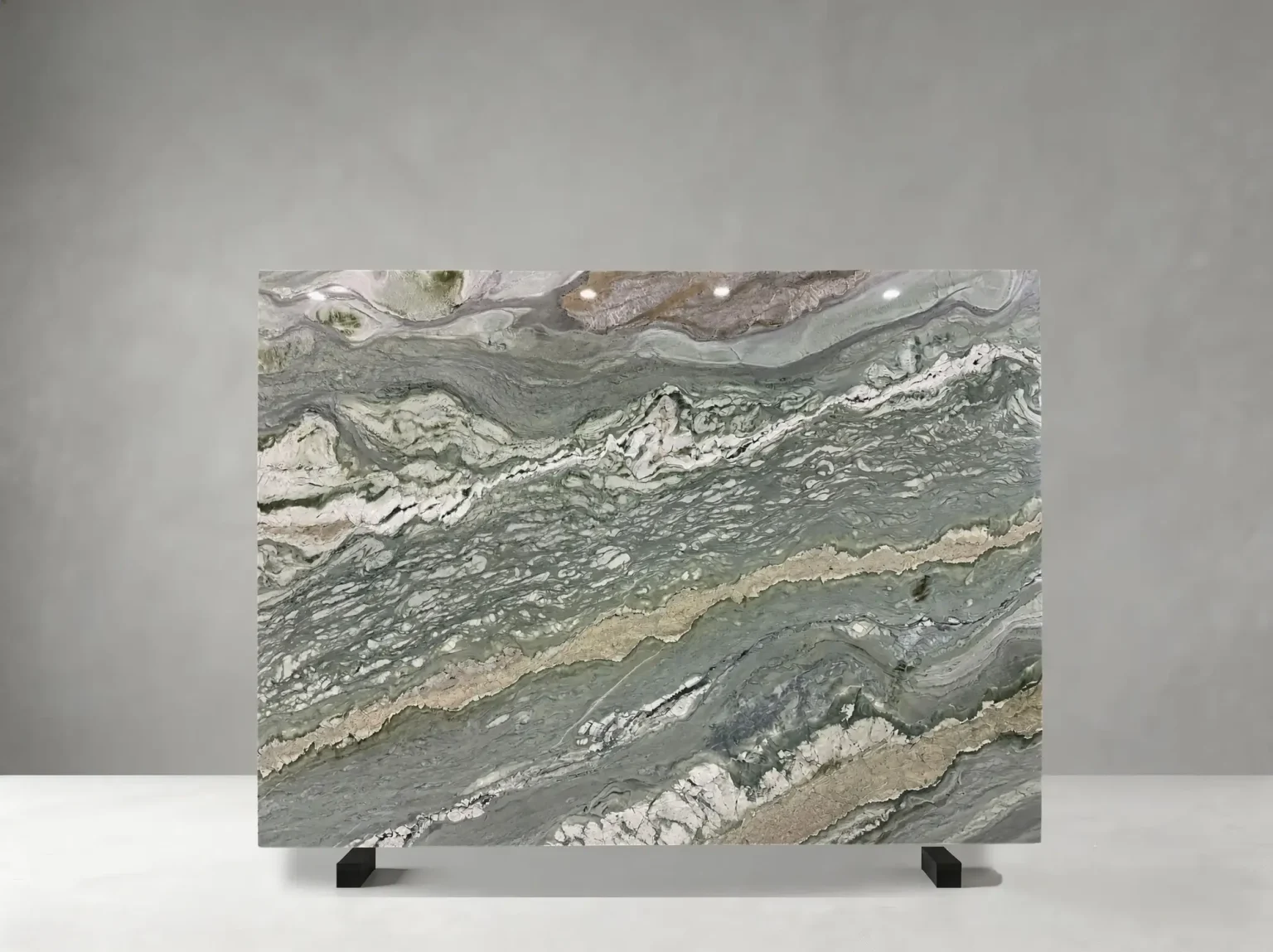 Tiffany Diamond Quartzite polished slab showing a distinctive sage-white surface with dramatic grey-green movement