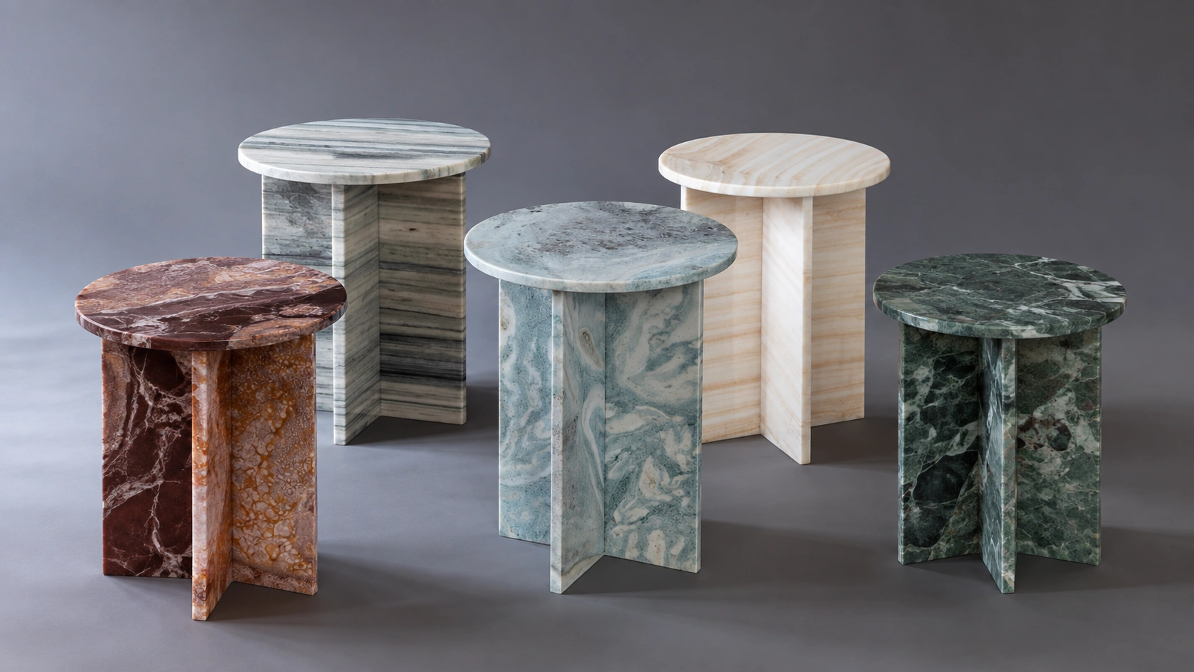 Custom round natural stone tables in marble and onyx for luxury retail display design