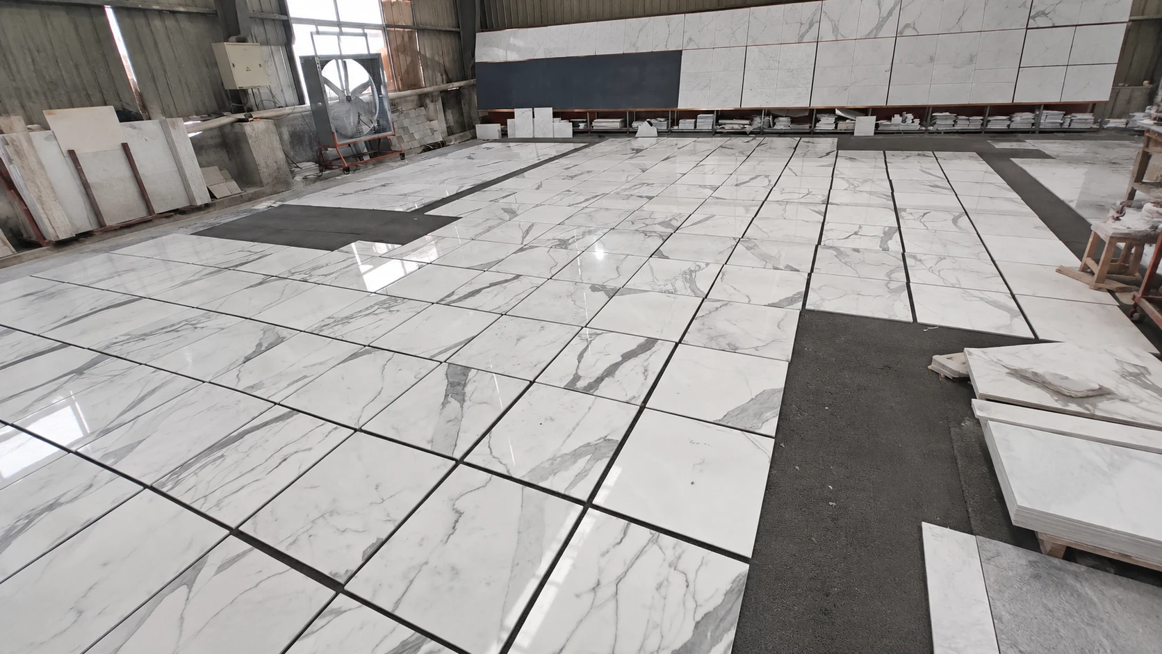 Natural stone dry lay inspection demonstrating layout matching and quality control